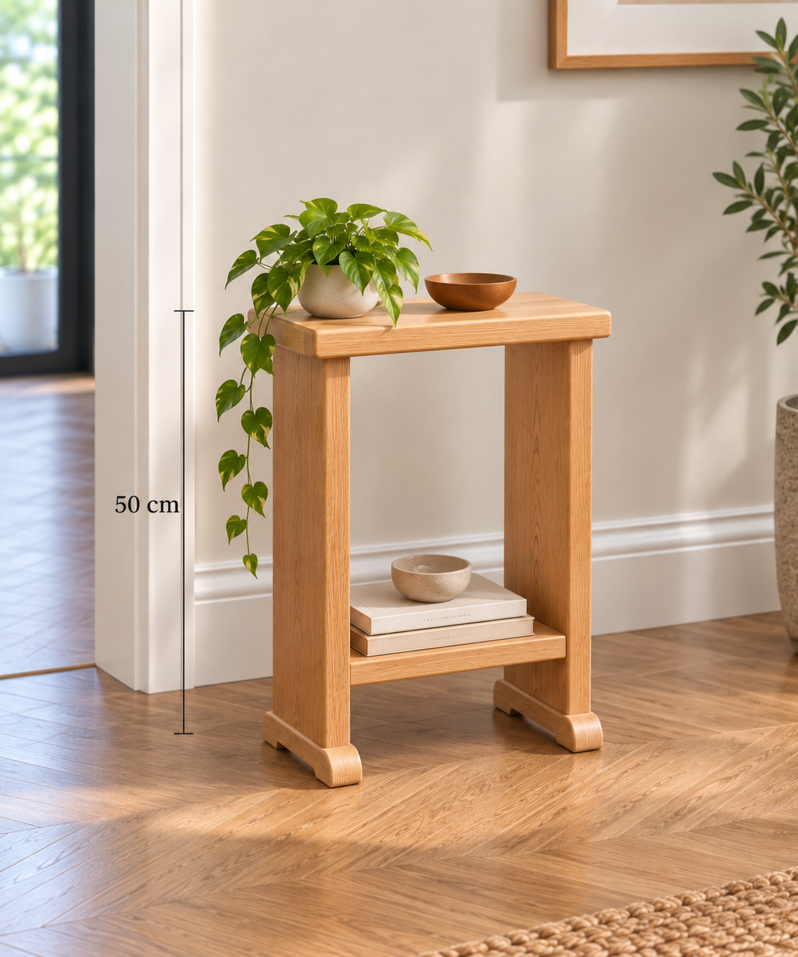 50 cm: Handmade solid oak side table, 50cm high, with lower shelf and rounded feet, displayed in a modern home interior.