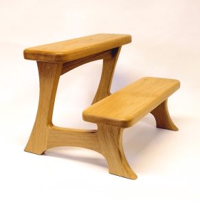 Golden Oak Perthö step stool showing curved solid oak sides