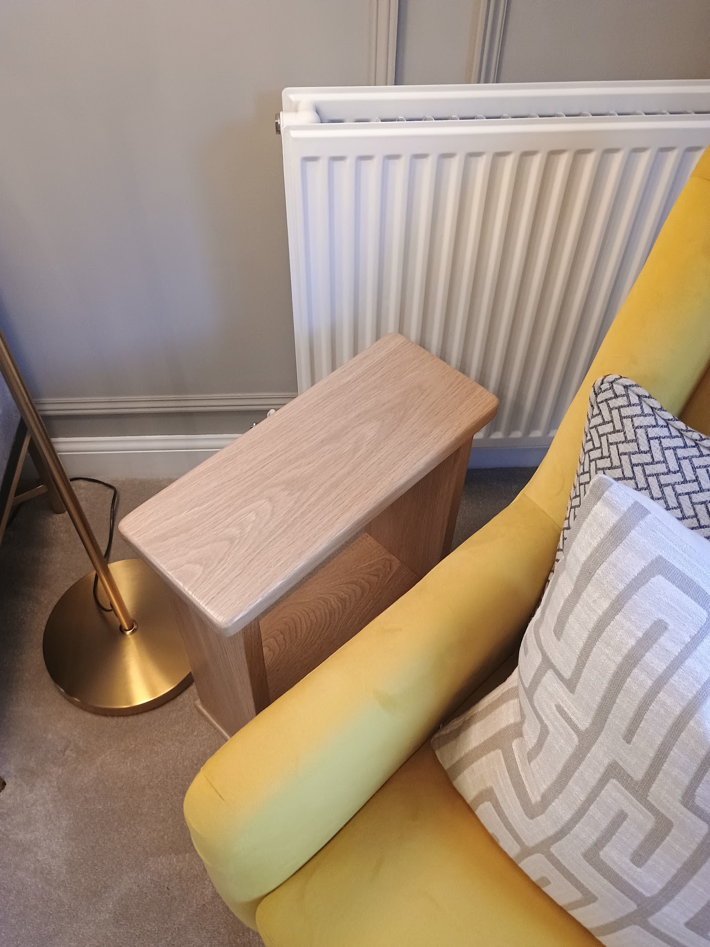 Solid European oak side table with lower storage shelf